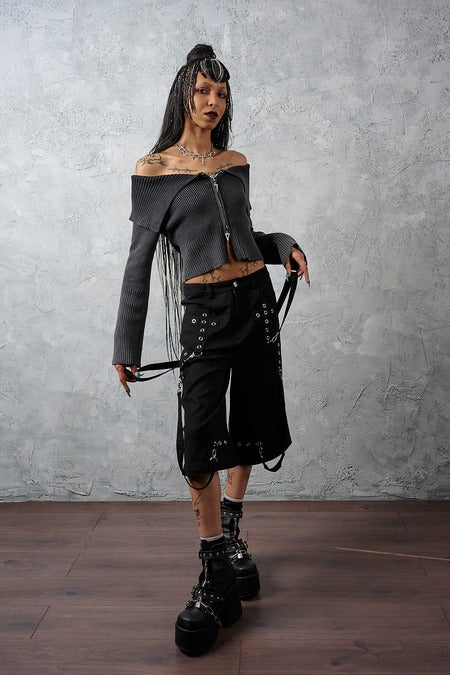Schwarze Schlaghose Dropzone Trousers mit Ösen, Riemen und abnehmbaren Beinen von Banned