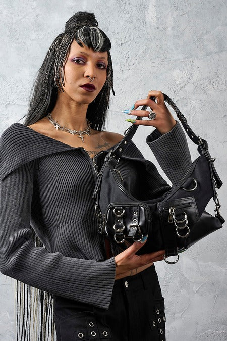 Schwarze Handtasche Nightshift Cargo Bag mit vielen Details von Banned
