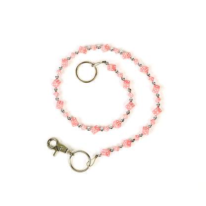 Silberfarbende Rockabilly Würfelkette Pink Klein mit rosafarbenden Würfeln im 3D-Design