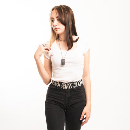 Schwarz-weißer Gürtel 2-reihig Zebra Ösen mit Kunstfell