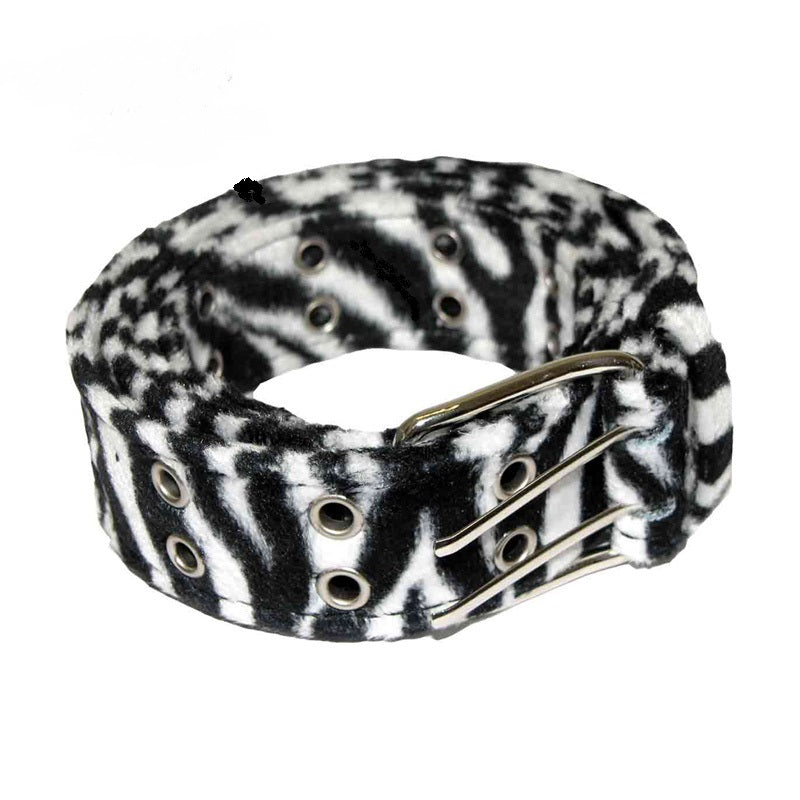 Schwarz-weißer Gürtel 2-reihig Zebra Ösen mit Kunstfell