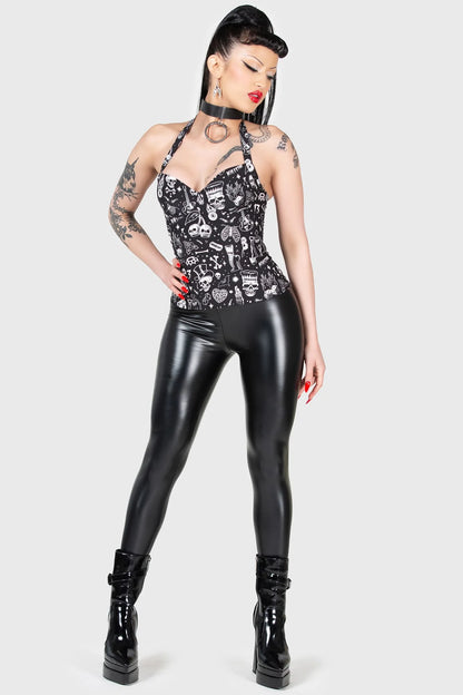 Schwarzes Top BURN RUBBER HALTER TOP mit weißem, kleinen Allover-Print im Rockabilly-Style von Killstar