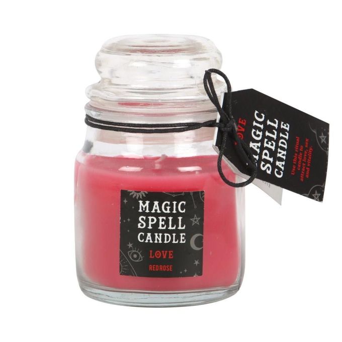 Glas mit roter Kerze mit Aufkleber mit der Aufschrift 'Magic Spell Candle Love'