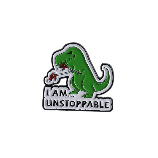 Kleiner, grüner Emaille-Anstecker UNSTOPPABLE ENAMEL PIN in Form eines Dinos von Moon Attic