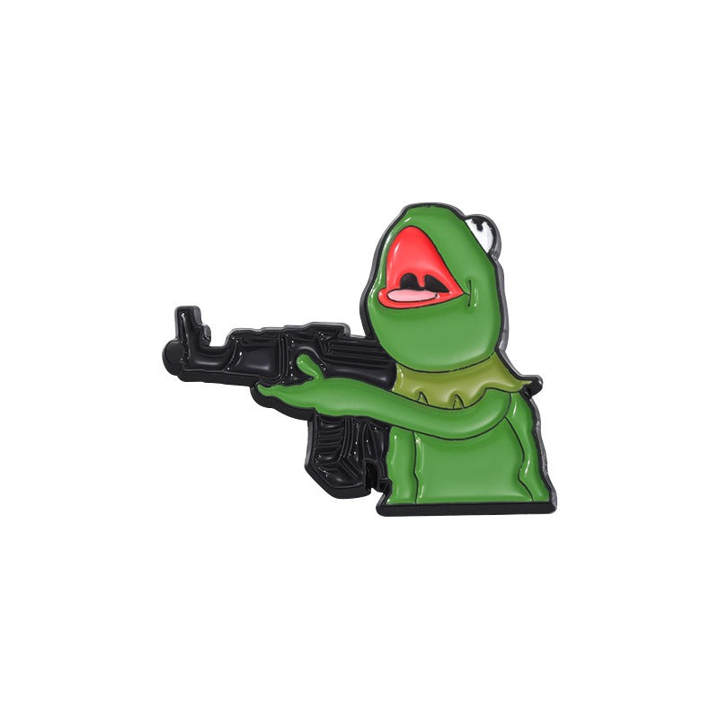 Kleiner, grüner Emaille-Anstecker RIFFLE KERMIT ENAMEL PIN mit Kermit mit Maschinengewehr von Moon Attic