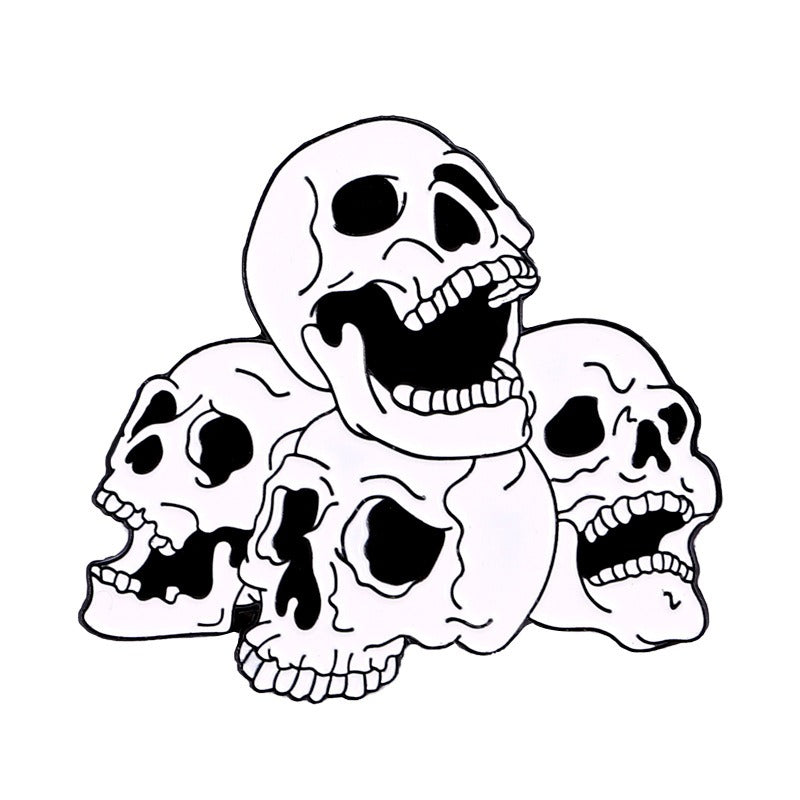 Four Skulls ENAMEL PIN 