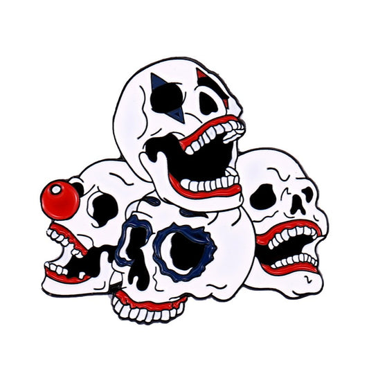 Kleiner Emaille-Anstecker CLOWN SKULLS ENAMEL PIN mit vier als Clowns geschmickten Schädeln von Moon Attic